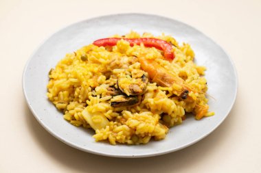 Classic dish of Spain, paella in white plate