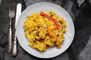Classic dish of Spain, paella in white plate