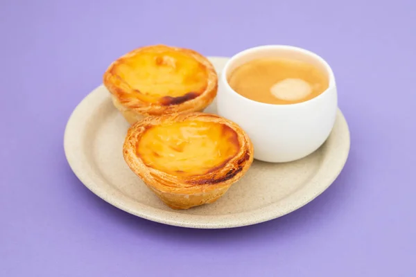 stock image Egg tart, traditional Portuguese dessert, pastel de nata and cup of coffee