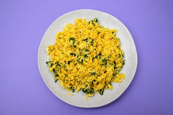 mixed rice with egg and spinach on plate