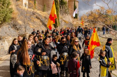 GERGAL, SPAIN - 21 JANUARY 2023 People dressed in beautiful costumes of Moors and Christians taking part in a traditional celebration, in the small Spanish village of Gergal, in the province of Almeria, Spain