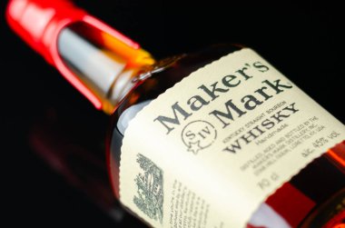 LONDON, UNITED KINGDOM - JULY 24, 2022 The original Maker's Mark in a characteristic squarish bottle sealed with red wax, famous American whisky