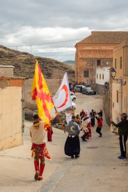 GERGAL, SPAIN - 21 JANUARY 2023 People dressed in beautiful costumes of Moors and Christians taking part in a traditional celebration, in the small Spanish village of Gergal, in the province of Almeria, Spain