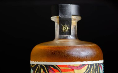 LONDON, UNITED KINGDOM - AUGUST 23, 2021 Caribbean rum, the blend contains a 3-year old 100% Pot Still rum from the Worthy Park Distillery, Jamaica combined with a 5-year old rum from the Foursquare clipart