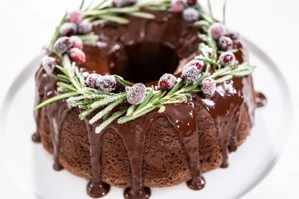 Chocolate Bundt Cake Chocolate Frosting Decorated Fresh Cranberries Rosemary Covered — Stock Photo, Image