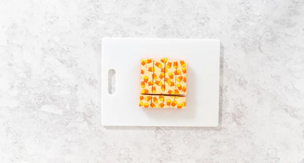 Flat Lay Cutting Candy Corn Fudge Square Pieces White Cutting — Stock Photo, Image