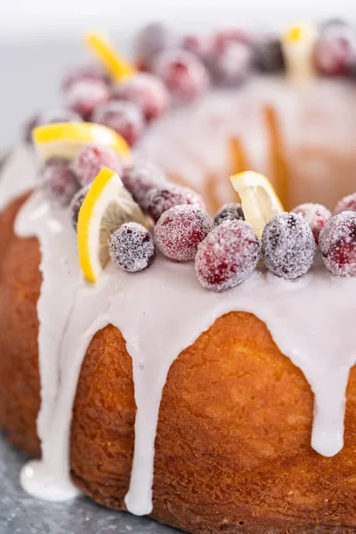 Lemon Cranberry Bundt Cake Decorated Sugar Cranberries Lemon Wedges Cake — Stock Photo, Image