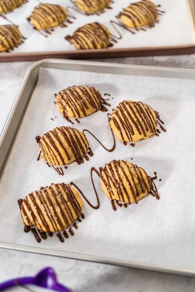 Drizzling Melted Chocolate Banana Cookies — Stock Photo, Image