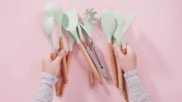 Flat Lay New Blue Silicone Kitchen Utensils Wooden Handles Pink — Stock Video