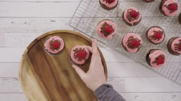 Time Lapse Flat Lay Gourmet Chocolate Raspberry Cupcakes Drizzled Chocolate — Stock Video