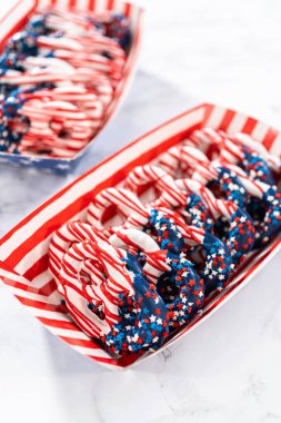 American flag. Red, white, and blue chocolate-covered pretzel twists.
