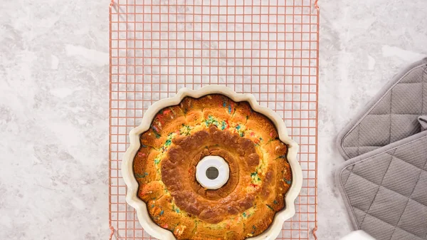 Flat Lay Step Step Removing Freshly Baked Funfettti Bundt Cake — Stock Photo, Image