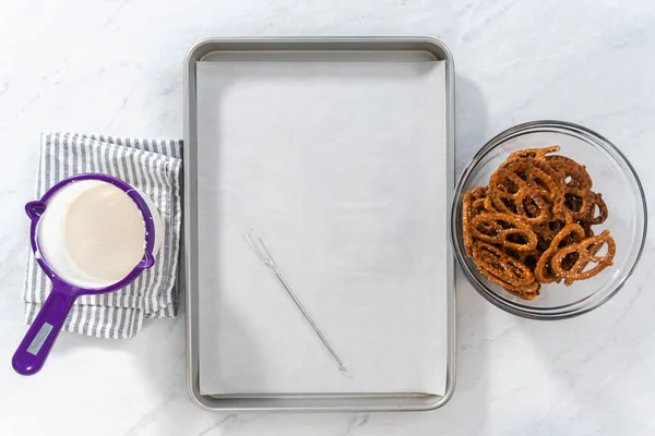 Flat Lay Dipping Pretzels Twists Melted Chocolate Make Chocolate Covered — Zdjęcie stockowe