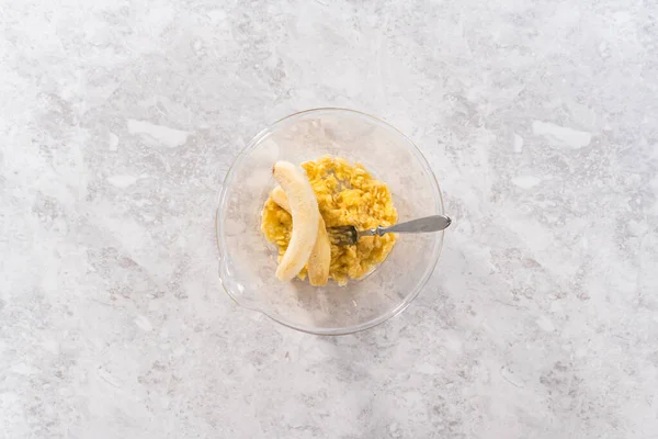 Smashing Riped Bananas Glass Mixing Bowl Prepare Coconut Banana Pancakes — Stock Photo, Image