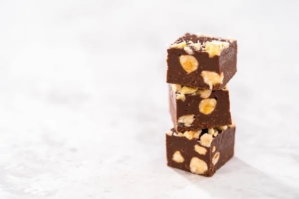 Homemade Chocolate Hazelnut Fudge Square Pieces Stacked Kitchen Counter — Stock Photo, Image