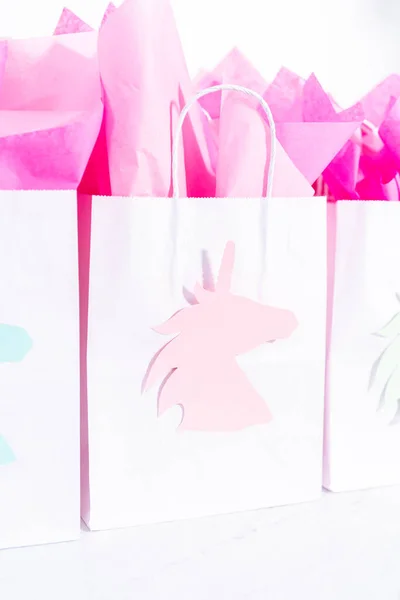 Unicorn Birthday party favor bags for a little girls Birthday party.
