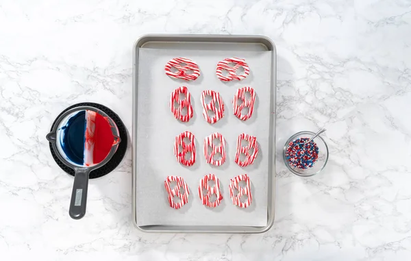 Flat Lay Dipping Pretzels Twists Melted Chocolate Make Red White — Zdjęcie stockowe
