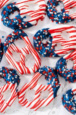 American flag. Red, white, and blue chocolate-covered pretzel twists.