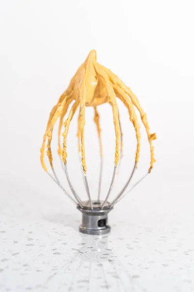 Freshly Whipped Dulce Leche Buttercream Frosting Whisk — Stock Photo, Image