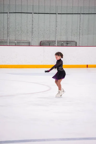Little Girl Practicing Her Figure Skating Competition Indoor Ice Rink — Stockfoto