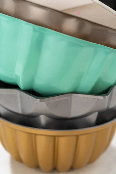 Stack Different Colors Shapes Bundt Cake Pans — Stock Photo, Image