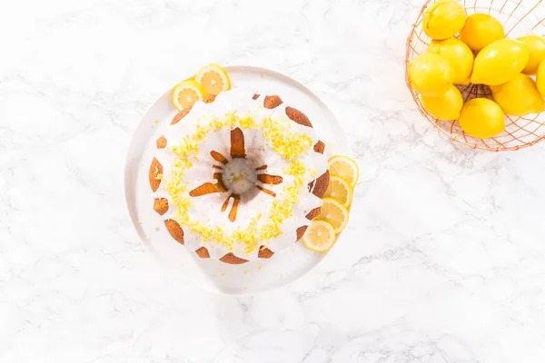 Flat Lay Lemon Bundt Cake Decorated Lemon Zest Cake Stand — Stock Photo, Image