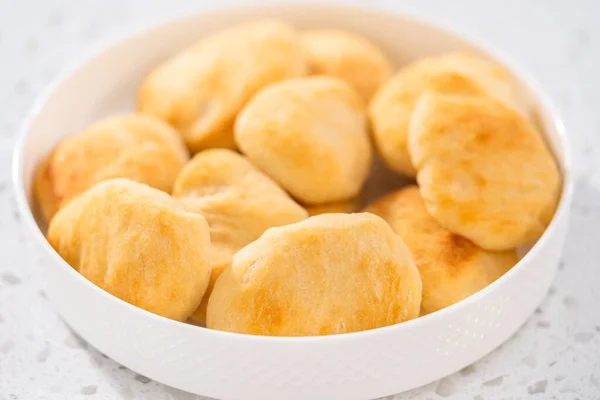 stock image Serving homemade naan dippers on a white plate.