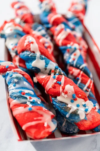 Patriotic Cinnamon Twists Drizzled White Glaze Decorated Star Sprinkles — Stock Photo, Image