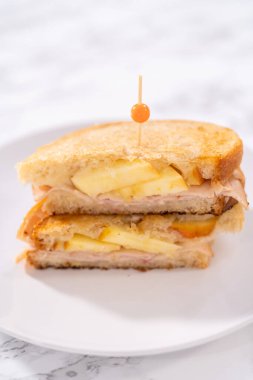 Freshly made provolone and apple grilled cheese sandwich.