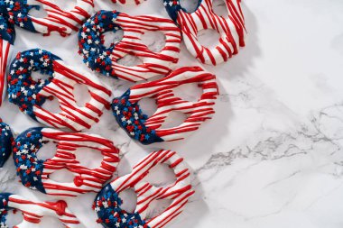 American flag. Red, white, and blue chocolate-covered pretzel twists.