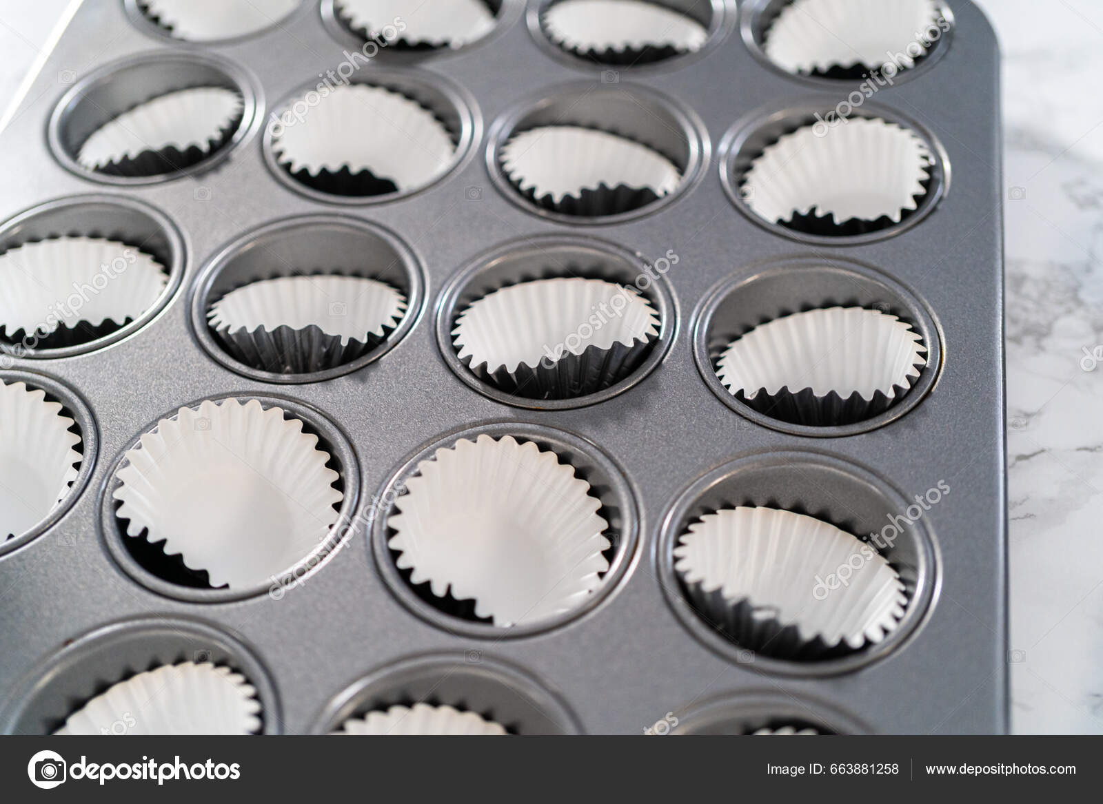 https://st5.depositphotos.com/1118354/66388/i/1600/depositphotos_663881258-stock-photo-scooping-cupcake-batter-dough-scoop.jpg
