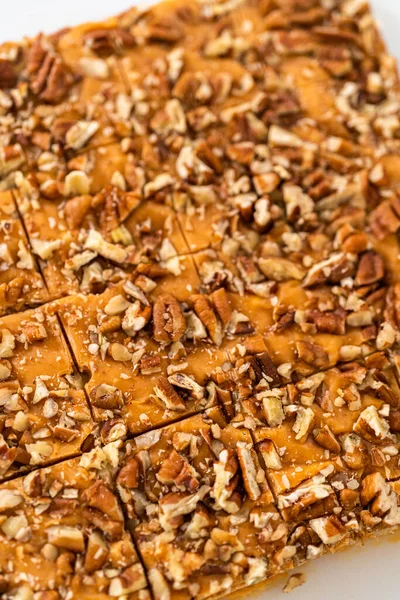 Cutting Pumpkin Spice Fudge Square Pieces White Cutting Board — Stock Photo, Image