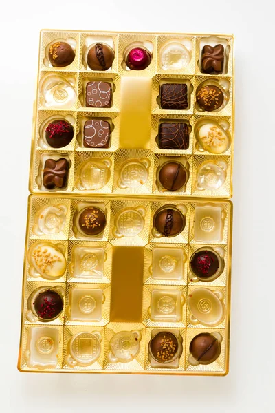 Gourmet Chocolates Golden Box White Background — Stock Photo, Image