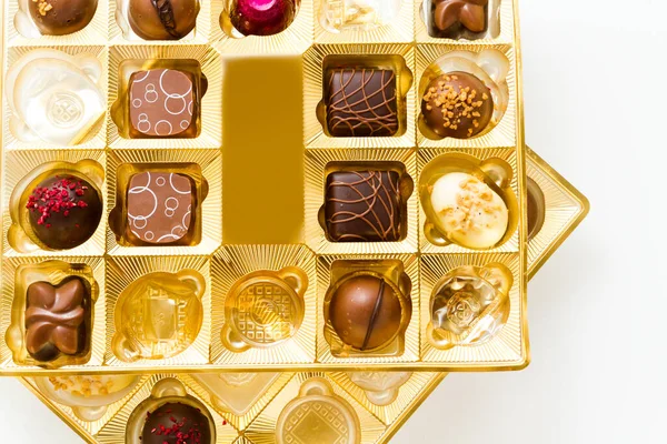 Gourmet Chocolates Golden Box White Background — Stock Photo, Image
