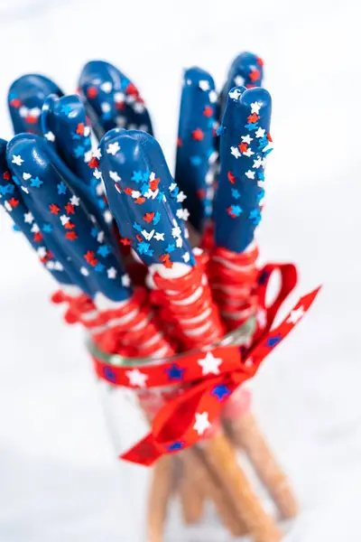 Homemade Chocolate Covered Pretzel Rods Decorated American Flag Glass Jar — Stock Photo, Image