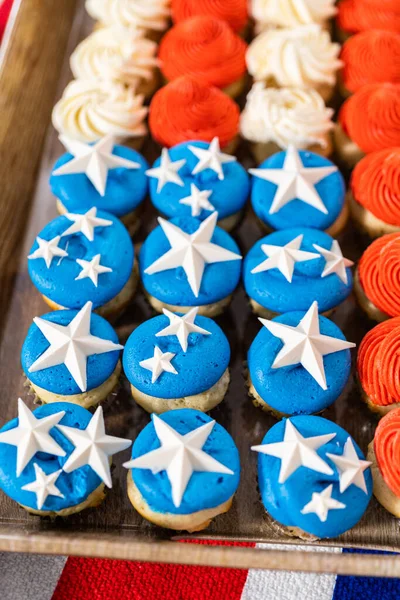 Arranging Mini Vanilla Cupcakes Shape American Flag Royalty Free Stock Photos