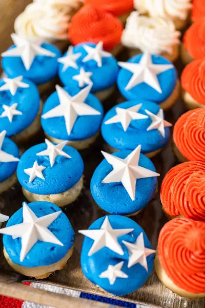 Arranging Mini Vanilla Cupcakes Shape American Flag Stock Image