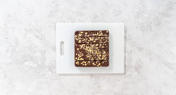 Flat Lay Cutting Chocolate Hazelnut Fudge Large Kitchen Knife Square — Stock Photo, Image