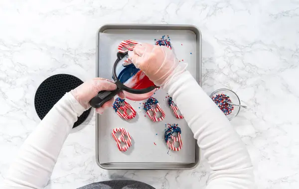 Flat Lay Dipping Pretzels Twists Melted Chocolate Make Red White — Stock Photo, Image