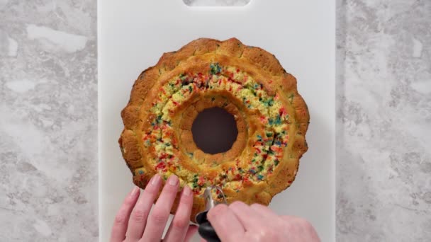 Flat Lay Creating Holes Buttercream Filling Funfettti Bundt Cake — Stock Video