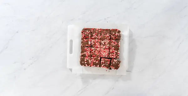 Flat Lay Cutting Freshly Baked Peppermint Brownies Chocolate Peppermint Chips — Stock Photo, Image