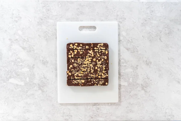Flat Lay Cutting Chocolate Hazelnut Fudge Large Kitchen Knife Square — Stock Photo, Image