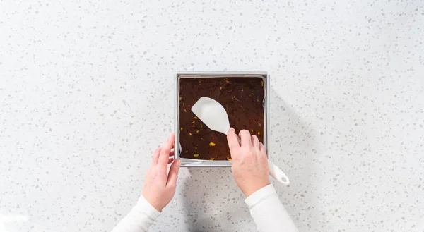 Flat Lay Filling Square Cheesecake Pan Lined Parchment Paper Fudge — Fotografia de Stock