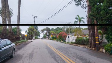 Los Angeles, California, ABD-4 Aralık 2022 Miramar Sahili, Kaliforniya sokaklarında gezinen kasvetli kış havası tuhaf sahil kasabası üzerinde sakin bir atmosfer yaratıyor..