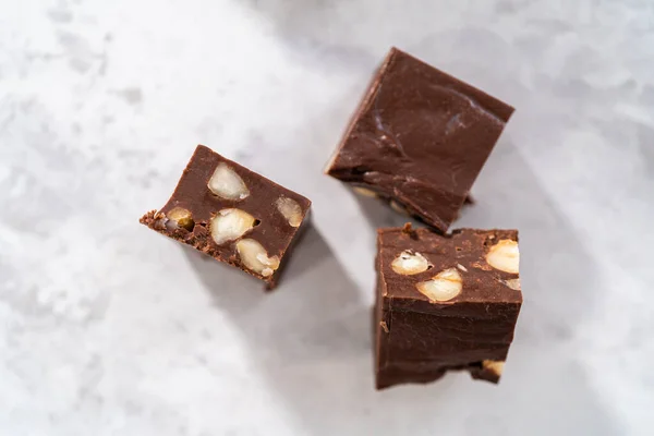 Homemade Chocolate Macadamia Fudge Square Pieces Kitchen Counter — Stock Photo, Image