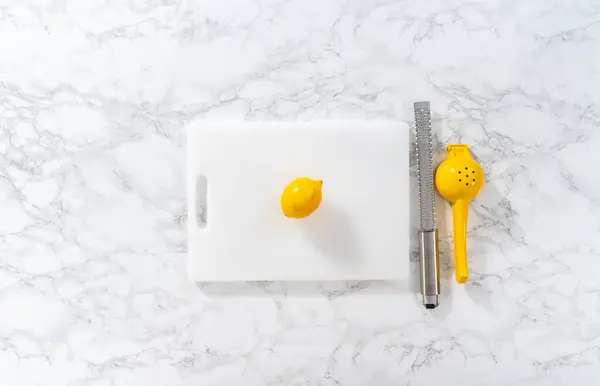 Zesting Juicing Fresh Lemon White Cutting Board — Stock Photo, Image