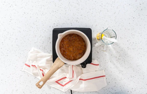 Flat Lay Caramelizing Sugar Saucepan Make Caramel Cupcake Toppers — Stock Photo, Image