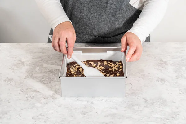 Filling Square Cheesecake Pan Lined Parchment Paper Fudge Mixture Prepare — Fotografie, imagine de stoc