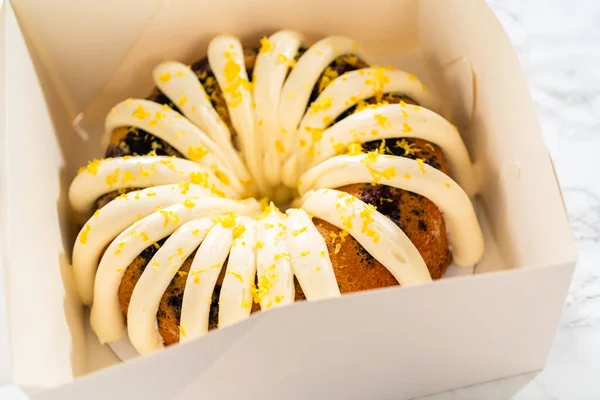 Freshly Baked Bundt Cakes Carefully Nestled White Paper Boxes Preparing — Stock Photo, Image