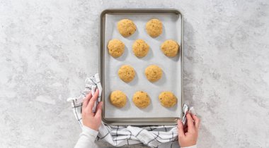 Flat lay. Cooling freshly banana cookies on a kitchen counter.